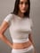 Calvin Klein Kadın Pamuklu Slim Fit Yuvarlak Yaka Elastik Bantlı Crop Gri T-Shirt LV00QS7349-P7A