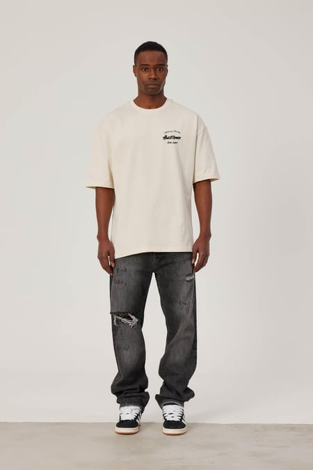 About Nomarc Yazılı Krem Tshirt