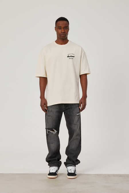 About Nomarc Yazılı Krem Tshirt