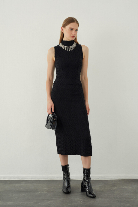 Kabartma desenli midi triko etek