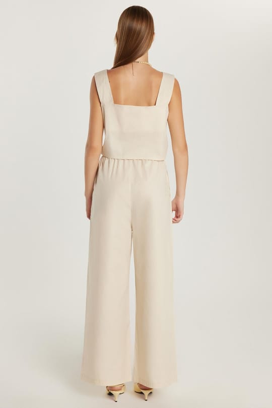 Kadın Slim Fit Dar Kesim Beli Lastikli Bol Paça Askılı Yaka Bej Tulum 