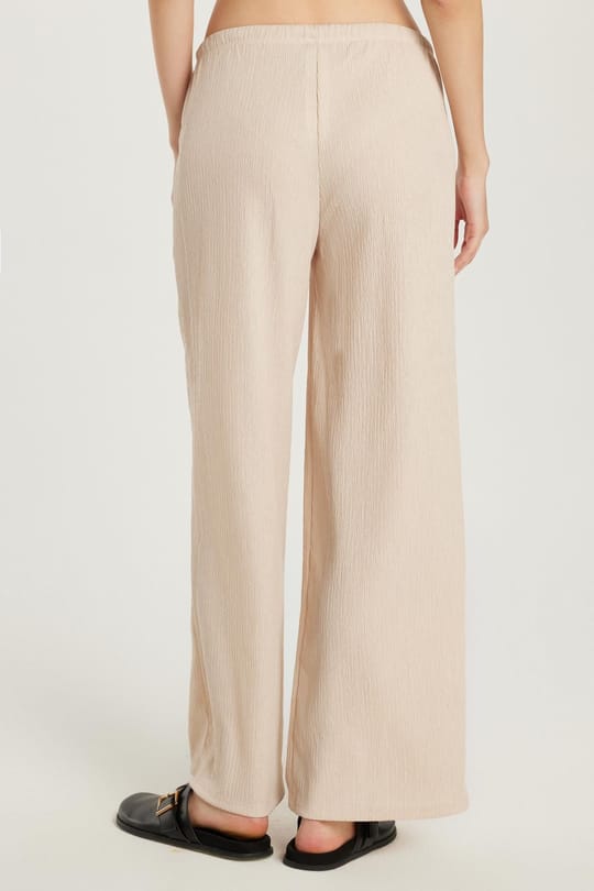 Kadın Slim Fit Gofre Raşel Beli Bağcıklı Geniş Paça Bej Pantolon