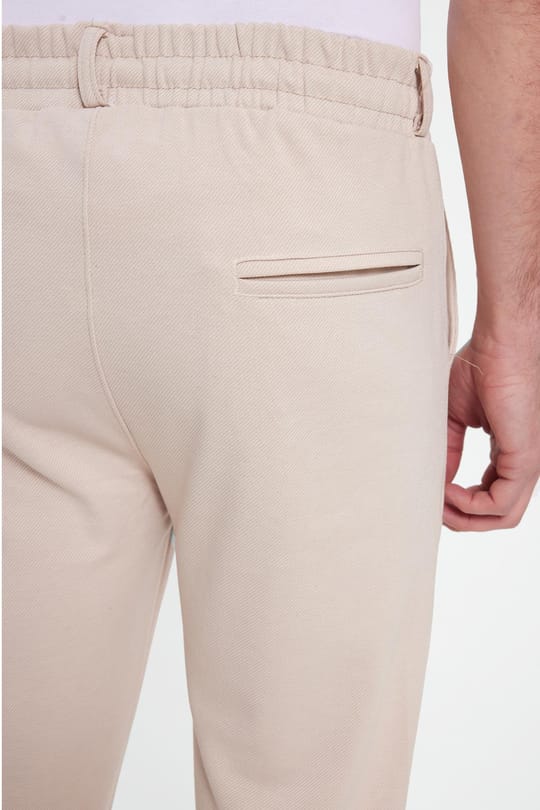 Erkek Slim Fit Pamuklu Beli Bağlamalı Yan Cepli Katlamalı Paça Jogger Bej Pantolon