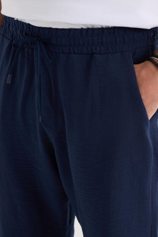 Erkek Standart Fit Normal Kesim Beli Bağcıklı Geniş Paça Lacivert Pantolon