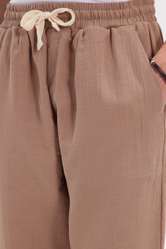 Erkek Baggy Fit Geniş Kesim %100 Pamuk Beli Lastikli Yandan Cepli Müslin Bej Düz Pantolon