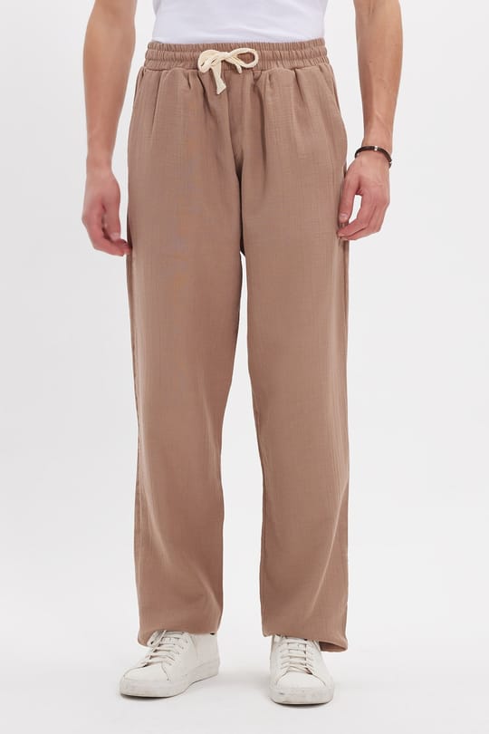 Erkek Baggy Fit Geniş Kesim %100 Pamuk Beli Lastikli Yandan Cepli Müslin Bej Düz Pantolon