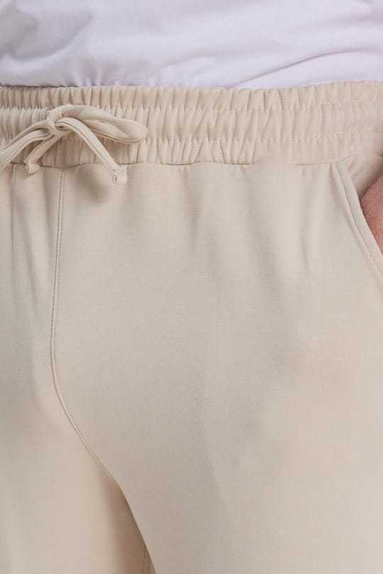 Erkek Slim Fit Dar Kesim Beli Bağcıklı 3 Cepli Geniş Paça Kemik Eşofman Altı