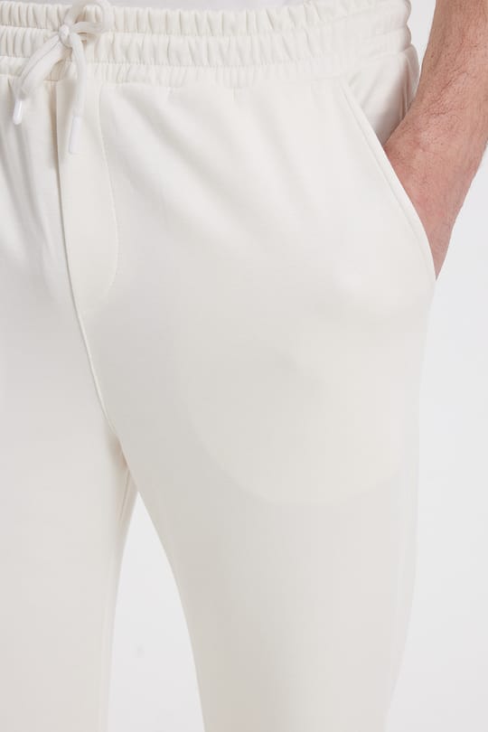 Erkek Ekru Baggy Fit Rahat Kesim Modal Kumaş Soft Doku Beli Bağcıklı Yan Cepli Eşofman Altı