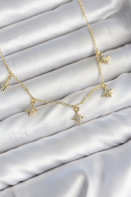 Pirinç Gold Renk Sıralı Minimal Kutup Yıldızı Model Kadın Kolye