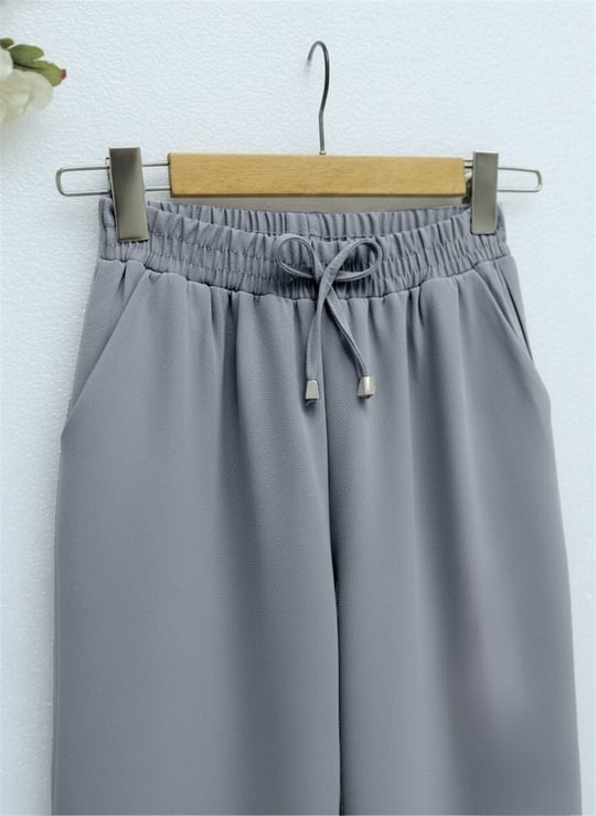 Beli Bağcıklı Dar Paça Pantolon    -Füme