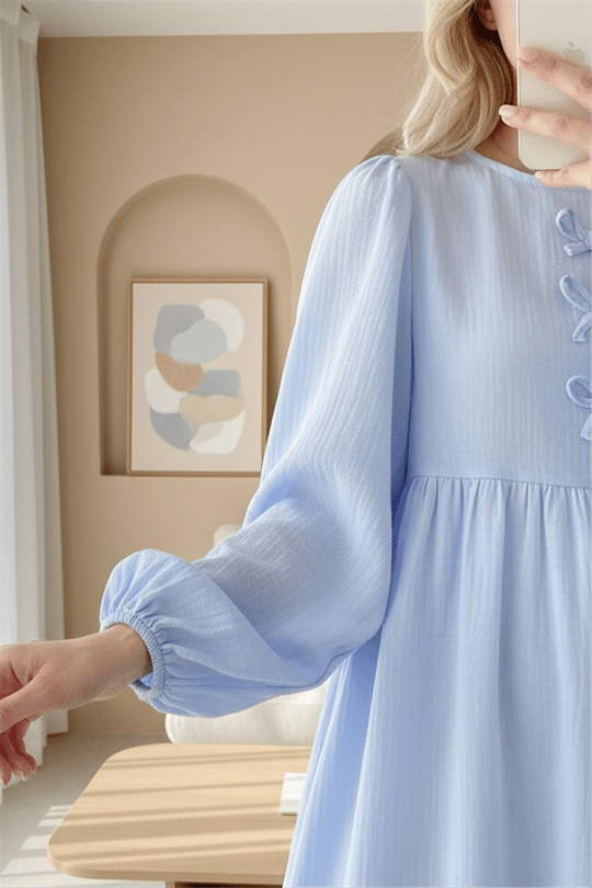 Önü Fiyonk Detaylı Kolları Lastikli Müslin Elbise -Bebe Mavi