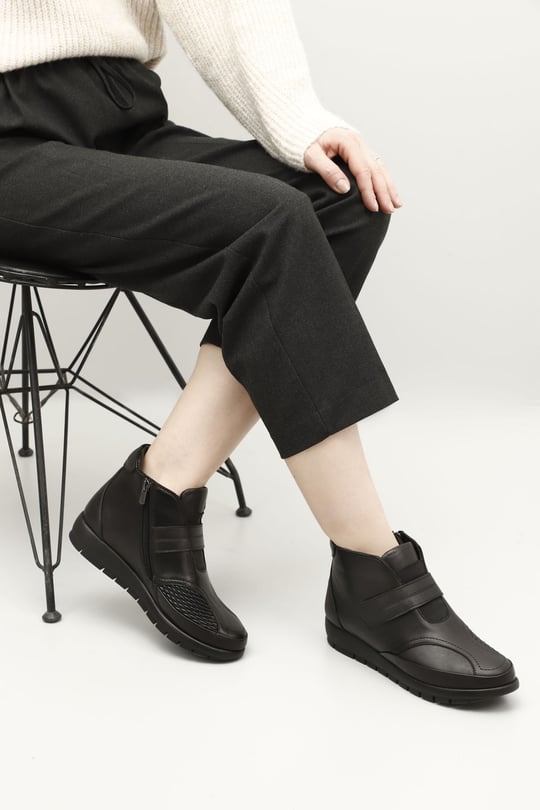 Women's Black Zippered Genuine Leather Boots with Bone Protrusion