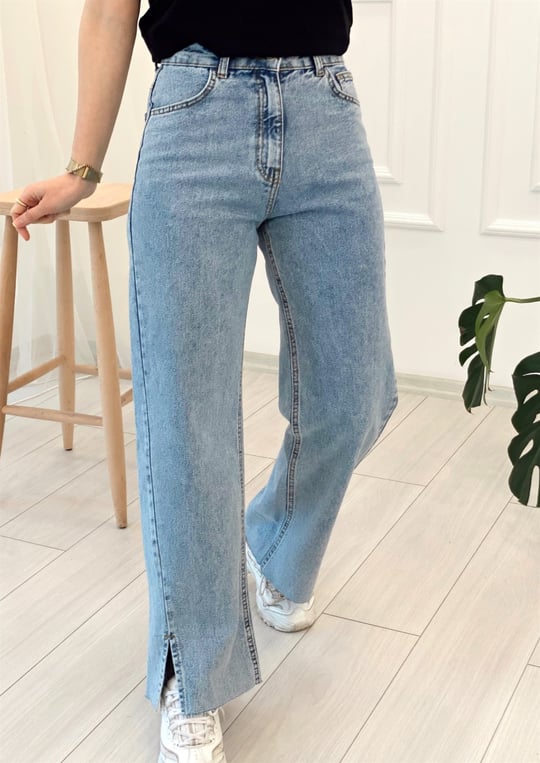 AÇIK MAVİ BOL PAÇA YIRTMAÇLI JEAN 