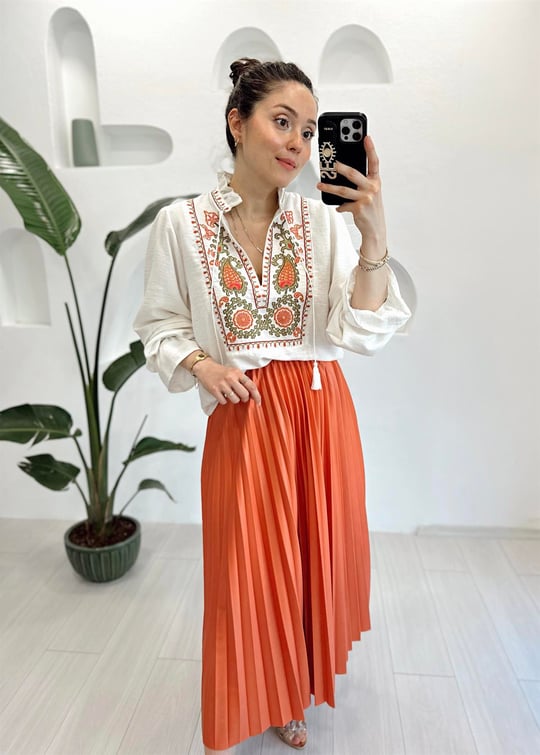 TURUNCU PİLELİ ETEK 