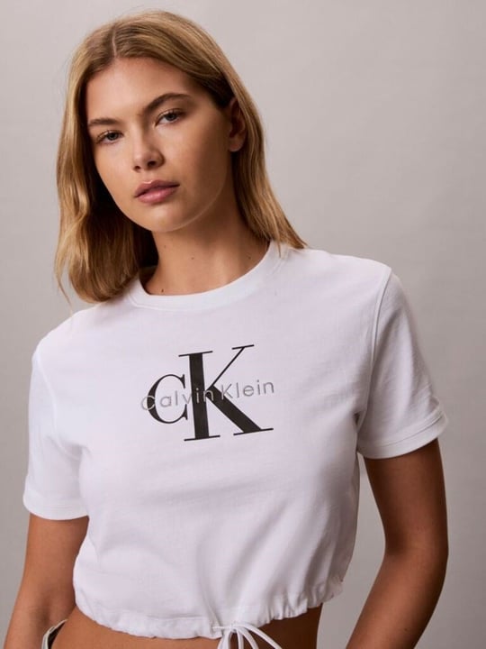 Calvin Klein Calvin Klein Kadın Rahat Kesim Esnek Pamuklu Örme KumaşCK Logo Detaylı Kısa Kollu Crop Beyaz T-Shirt LV047G288G-YAF