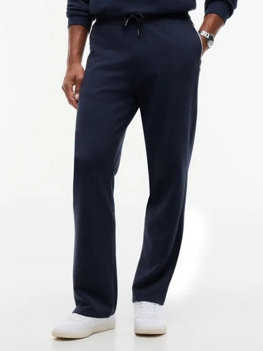 Tommy Hilfiger Tommy Hilfiger Erkek Regular Fit %100 Pamuk Havlu Kumaş Beli Bağcıklı Fermuarlı Cepli Şerit Detaylı Mavi Eşofman Altı MW0MW44991-DUR