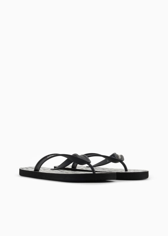 ARMANI EXCHANGE Armani Exchange Unısex Düz ve Rahat Taban Marka Logo Dokulu Parmak Arası Siyah-Beyaz Terlik XUQ002 XV676-N814