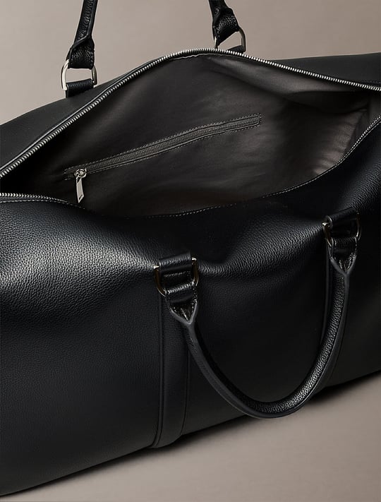 Calvin Klein Calvin Klein Erkek Deri Geniş Kısa Kulp Ve Uzun Omuz Askı Metal Logo Siyah Valiz LV04D3158G-UB1
