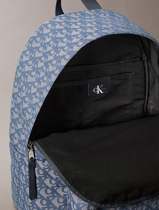 Calvin Klein Calvin Klein Erkek Fermuarlı Ön Cepli CK Monogram Logo Desenli Dizüstü Bilgisayar Bölmeli Gri Sırt Çantası LV04G3116G-K6B
