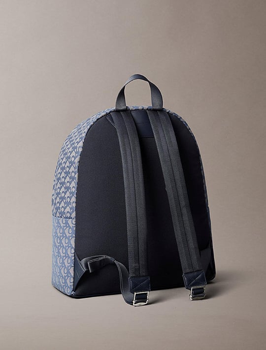 Calvin Klein Calvin Klein Erkek Fermuarlı Ön Cepli CK Monogram Logo Desenli Dizüstü Bilgisayar Bölmeli Gri Sırt Çantası LV04G3116G-K6B