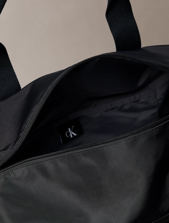 Calvin Klein Calvin Klein Erkek Geniş Fermuar Kapama Çok Bölmeli Düz Ck İşlemeli Logo Siyah Valiz LV04D3413G-UB1