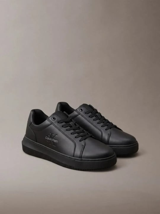 Calvin Klein Calvin Klein Erkek Hakiki Deri Düşük Bilekli CK Logo Kabartmalı Siyah Sneaker YM0YM01317-0GT