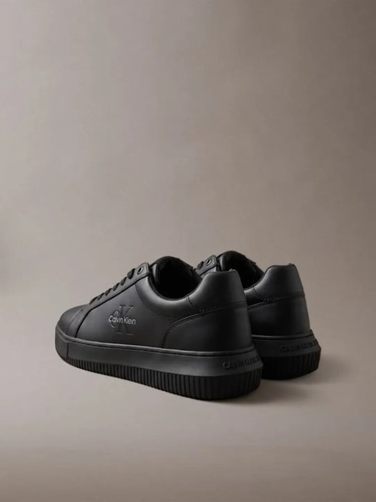 Calvin Klein Calvin Klein Erkek Hakiki Deri Düşük Bilekli CK Logo Kabartmalı Siyah Sneaker YM0YM01317-0GT