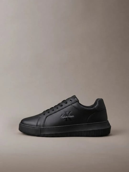 Calvin Klein Calvin Klein Erkek Hakiki Deri Düşük Bilekli CK Logo Kabartmalı Siyah Sneaker YM0YM01317-0GT