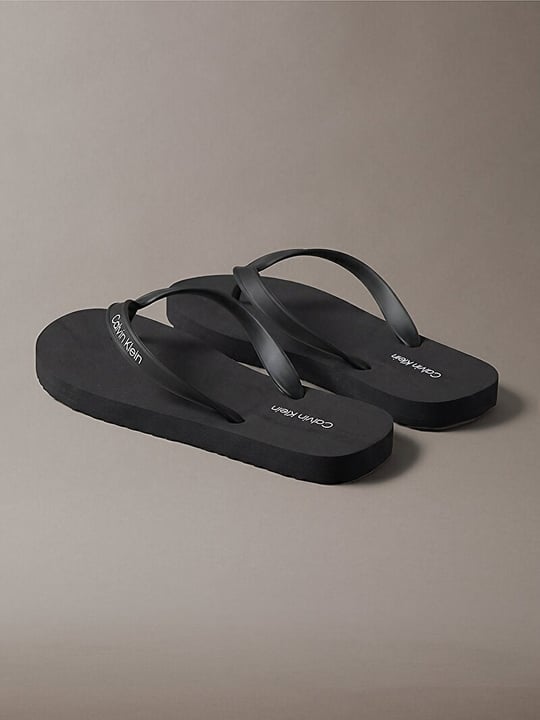 Calvin Klein Calvin Klein Erkek Logo İmzalı Rahat Düz Tabanlı Parmak Arası Siyah Terlik HM0HM02105-0GJ