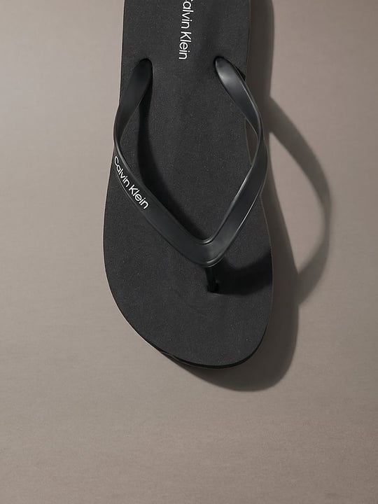 Calvin Klein Calvin Klein Erkek Logo İmzalı Rahat Düz Tabanlı Parmak Arası Siyah Terlik HM0HM02105-0GJ