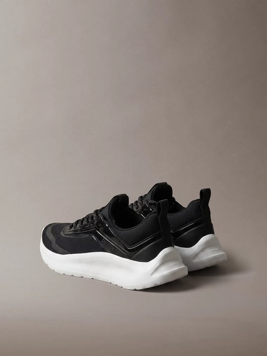Calvin Klein Calvin Klein Kadın File Yüzey Ultra Hafif EVA Tabanlı Logolu Siyah Sneaker HW0HW03434-0GM