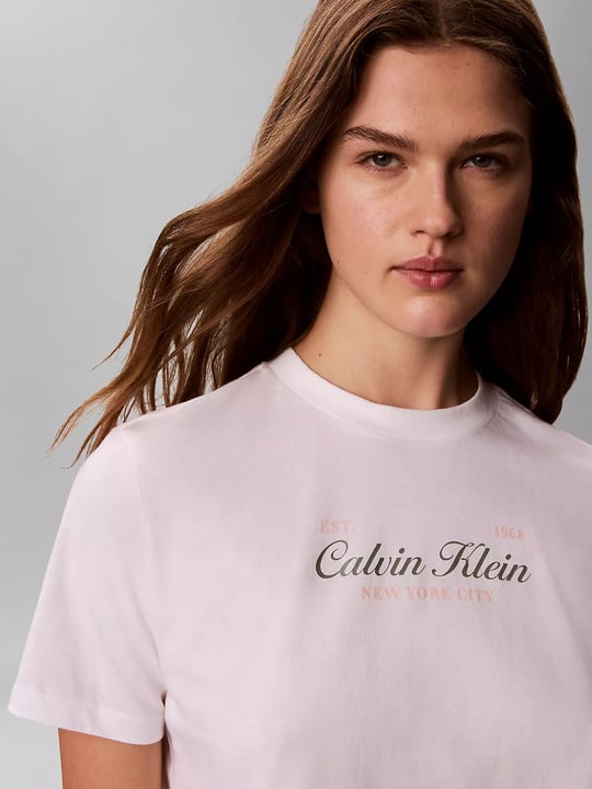 Calvin Klein Calvin Klein Kadın Normal Kesim Yuvarlak Yakalı Logo Baskılı Pamuklu Kısa Kollu Beyaz T-Shirt LV047G804G-YAF