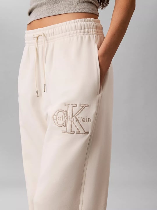 Calvin Klein Calvin Klein Kadın Rahat Kesim CK Logo İşlemeli Geniş Paça Ekru Eşofman Altı LV047G822G-YAS
