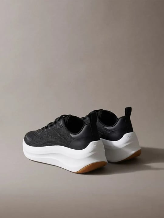 Calvin Klein Calvin Klein Kadın Yüksek ve Rahat Topuklu Nefes Alabilen Üst Yüzeyli Siyah Sneaker HW0HW03111-BEH