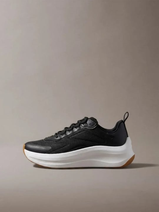 Calvin Klein Calvin Klein Kadın Yüksek ve Rahat Topuklu Nefes Alabilen Üst Yüzeyli Siyah Sneaker HW0HW03111-BEH