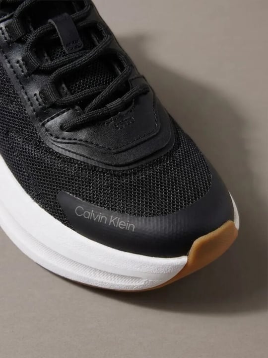 Calvin Klein Calvin Klein Kadın Yüksek ve Rahat Topuklu Nefes Alabilen Üst Yüzeyli Siyah Sneaker HW0HW03111-BEH