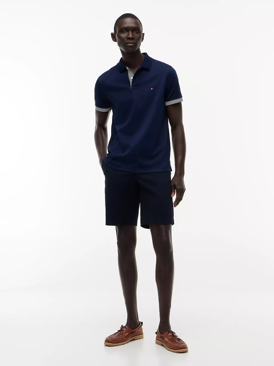 Tommy Hilfiger Tommy Hilfiger Erkek Normal Kalıp Kolunda ve Yakasında Çizgi Desenli Kısa Kollu Lacivert Polo Yaka T-Shirt MW0MW43296-DCC