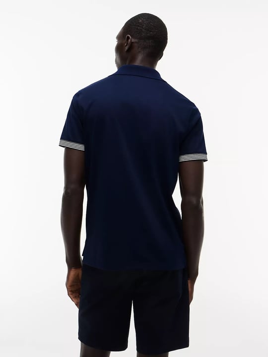 Tommy Hilfiger Tommy Hilfiger Erkek Normal Kalıp Kolunda ve Yakasında Çizgi Desenli Kısa Kollu Lacivert Polo Yaka T-Shirt MW0MW43296-DCC