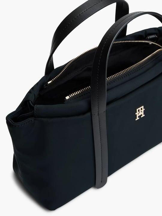 Tommy Hilfiger Tommy Hilfiger Kadın Fermuarlı Çift Saplı Çapraz Askılı TH Monogram Plakalı Siyah Omuz Çantası AW0AW18993-BDS