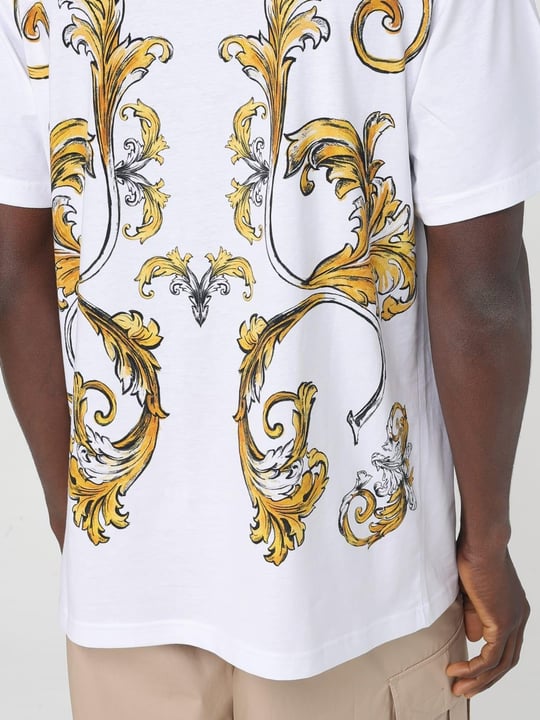Versace Versace Kadın Regular Fit Yuvarlak Yakalı Cep Detaylı Arkası Grafik Baskılı Kısa Kollu Beyaz-Altın T-Shirt 78GAH6RBJS462-G03