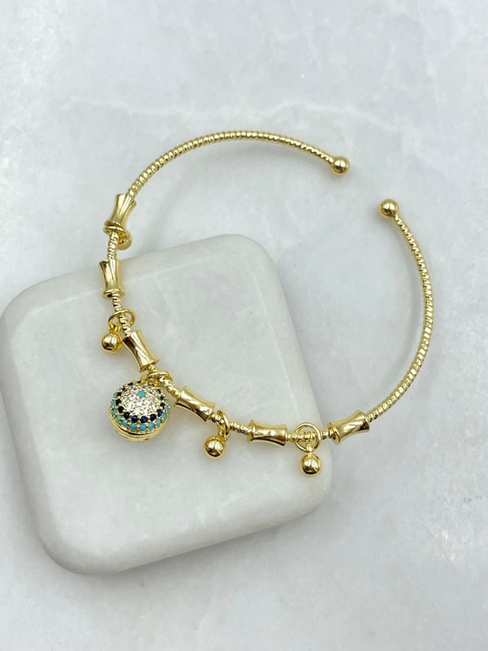 Zirkon Taşlı Nazar ve Topçuk Sallantılı Kelepçe Bileklik Gold