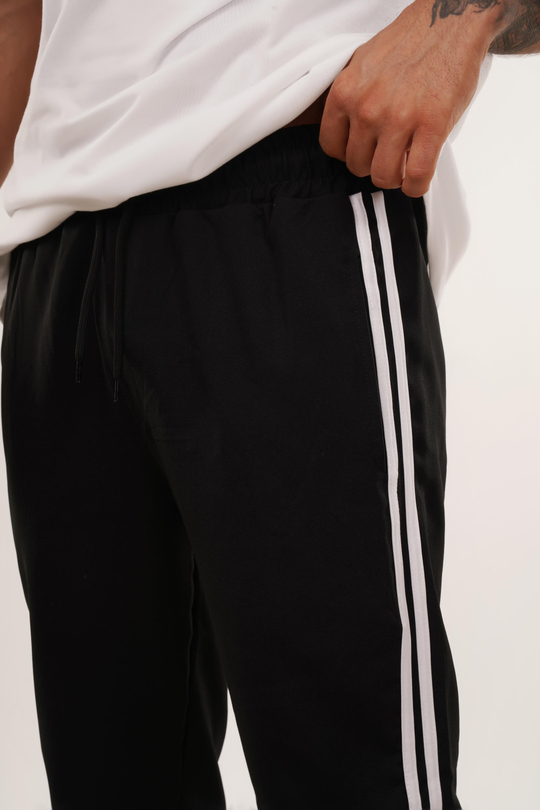 EŞOFMAN ALTI & JOGGERSiyah Dokuma Kumaş Yandan Çift Çizgi Baggy Pant. KNG