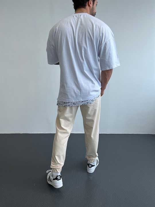 OVERSİZE TSHİRTLERBeyaz Göğüsten Maske Silah Nakışlı Etek Detaylı Oversize Tshirt BLTZ