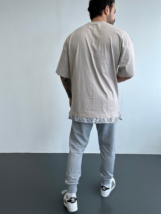 OVERSİZE TSHİRTLERKrem Göğüsten Maske Silah Nakışlı Etek Detaylı Oversize Tshirt BLTZ
