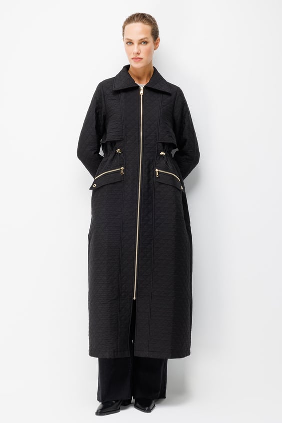Long coat with zipper closure and pocket details, made from Jacquard quilted fabric - Black