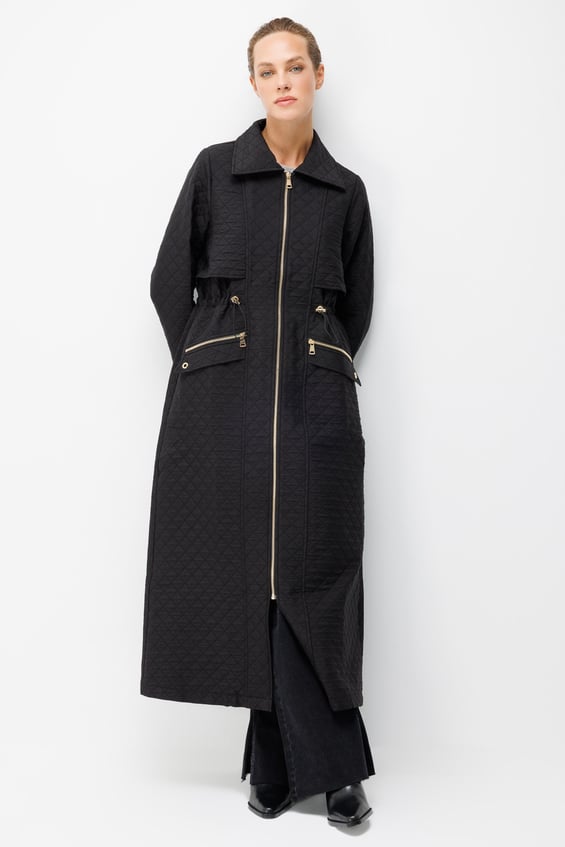 Long coat with zipper closure and pocket details, made from Jacquard quilted fabric - Black