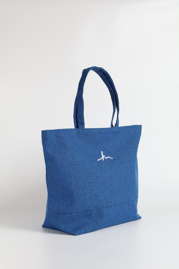 HaşemaHaşema حقيبة شاطئ زرقاء من الكتان لها شعار مطرز 21