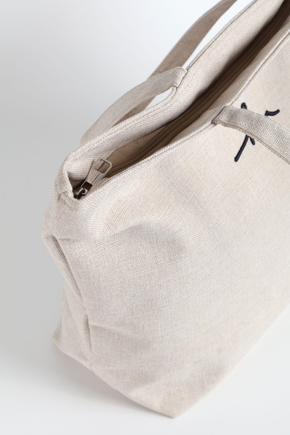 HaşemaHaşema حقيبة شاطئ أوف وايت من الكتان لها شعار مطرز 21