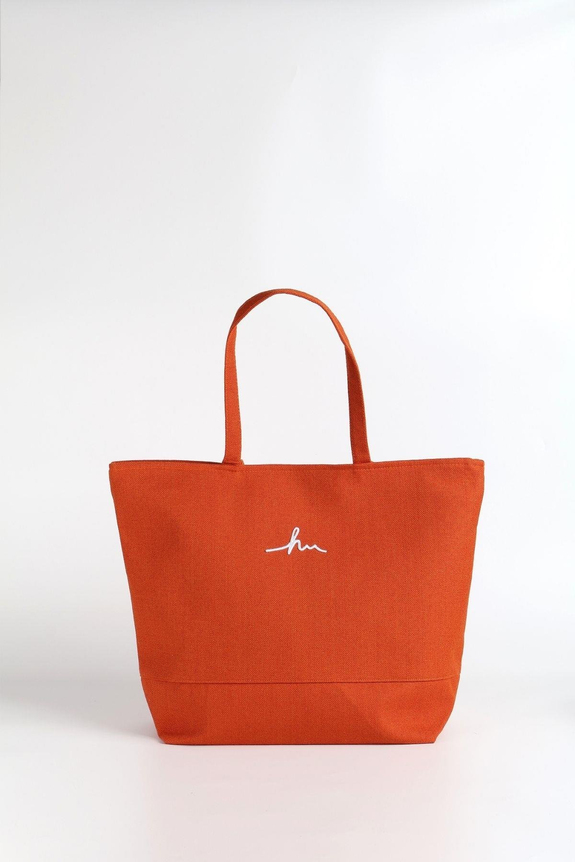 HaşemaHaşema حقيبة شاطئ برتقالية من الكتان لها شعار مطرز 21