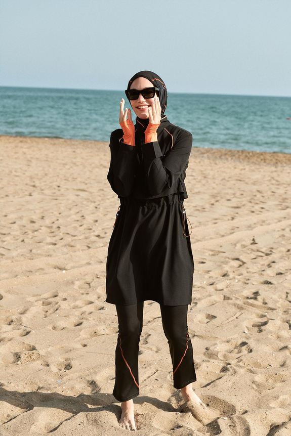 HaşemaHaşema طقم سباحة أسود بشريط برتقالي 5 قطع للمحجبات من سلسلة الأداء العالي 2019